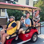 Taking a tour on the Scarlet Castine Touring Company golf cart
